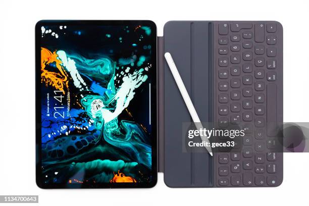 new apple computers ipad pro tablet - ipad pro stock pictures, royalty-free photos & images