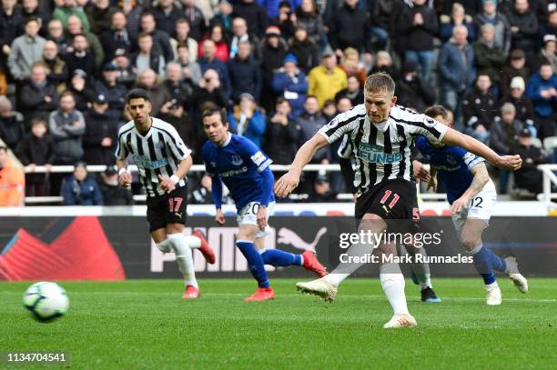 Matt Ritchie of Newcastle United shoots from a penalty which is saved by Jordan Pickford of Everton during the Premier League match between Newcastle...