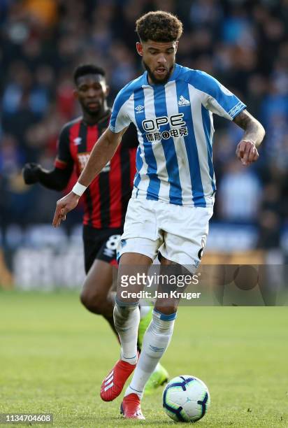Philip Billing of Huddersfield Town runs with the ball during the Premier League match between Huddersfield Town and AFC Bournemouth at John Smith's...