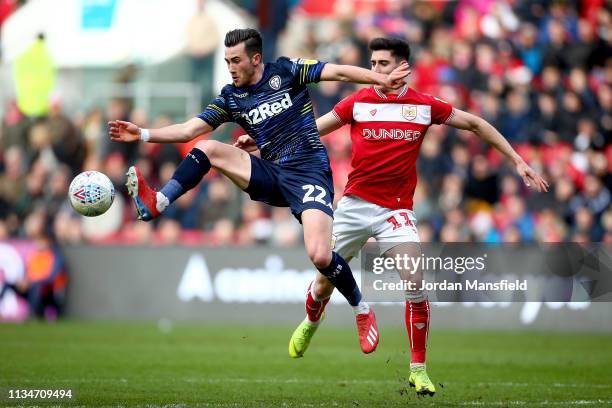 Kalvin Phillips of Leeds United controls the ball in the air under pressure from Callum O'Dowda of Bristol City during the Sky Bet Championship...