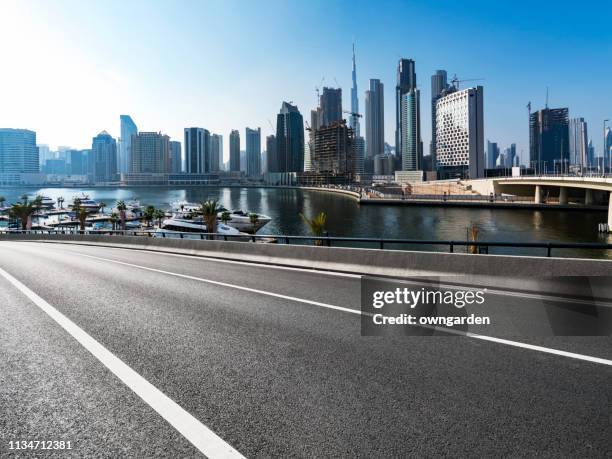 dubai city highway - dubai water canal stock pictures, royalty-free photos & images