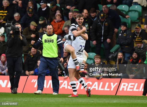 Harry Randall and Ian Madigan of Bristol Bears celebrates their win during the Gallagher Premiership Rugby match between Northampton Saints and...