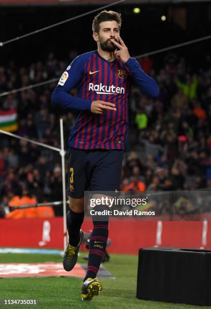 Gerard Pique of Barcelona celebrates after scoring his team's first goal during the La Liga match between FC Barcelona and Rayo Vallecano de Madrid...