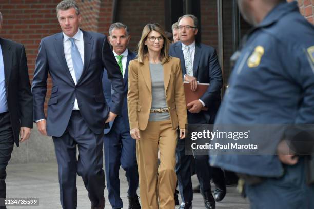 Lori Loughlin exits the John Joseph Moakley U.S. Courthouse after appearing in Federal Court to answer charges stemming from college admissions...