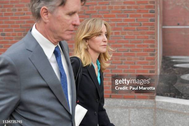 Felicity Huffman exits the John Joseph Moakley U.S. Courthouse after appearing in Federal Court to answer charges stemming from college admissions...