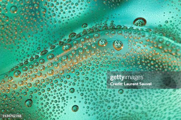 green water drops abstract background - bottle condensation stock pictures, royalty-free photos & images