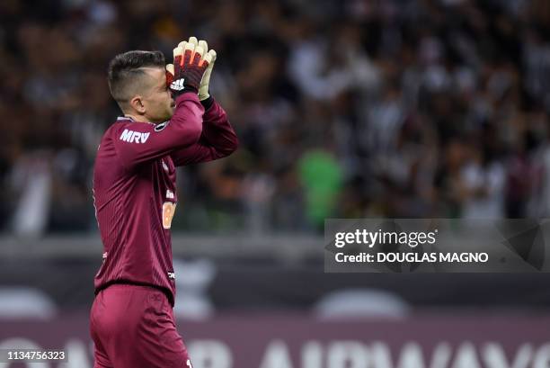 Brazil's Atletico Mineiro goalkeeper Victor gestures during the 2019 Copa Libertadores football match against Venezuela's Zamora at Mineirao Stadium,...