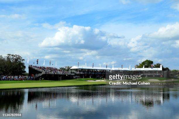 General view of the 18th green is seen as a gallery of fans watch play during the third round of the Arnold Palmer Invitational Presented by...