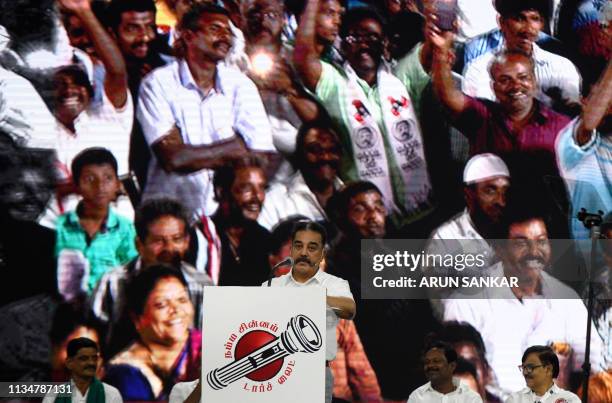 In this photo taken on March 24 Indian actor turned politician Kamal Haasan, founder of the Makkal Needhi Mayyam party, addresses supporters at an...
