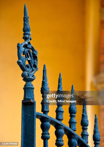 wrought iron gate detail - antique wrought iron fencing stock pictures, royalty-free photos & images