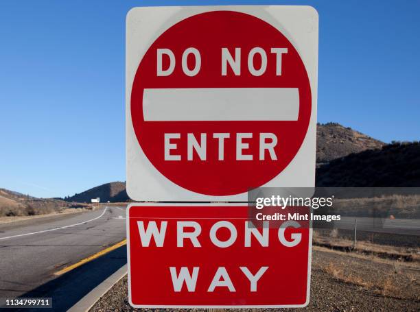 do not enter and wrong way signs - restricted area sign stock pictures, royalty-free photos & images
