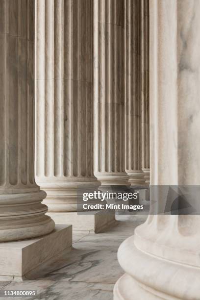 columns of the supreme court - washington dc architecture stock pictures, royalty-free photos & images