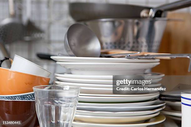 dishes in a kitchen - dirty pan stock pictures, royalty-free photos & images