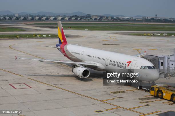 Asiana Airlines Airbus A321-200 with registration HL8257 as seen in Noi Bai International Airport HAN VVNB in Hanoi, Vietnam. The Korean airline is...