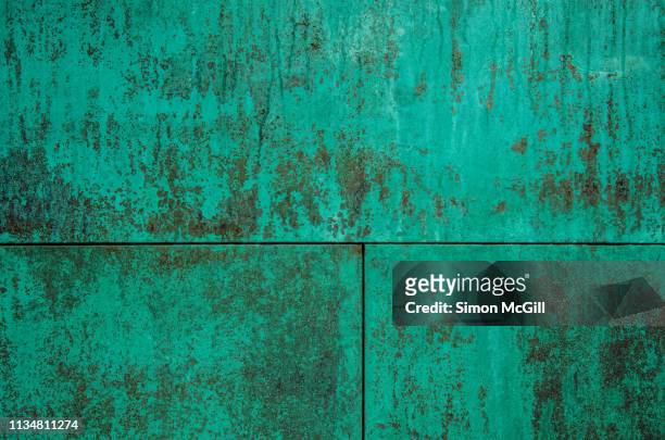 green patina (verdigris) on copper sheet metal - pátina fotografías e imágenes de stock