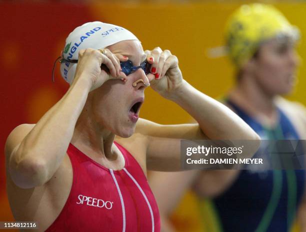 England's Karen Pickering prepares for the the 2002 Manchester Commonwealth Games women's 200m freestyle final 30 July 2002. Australian Petria...