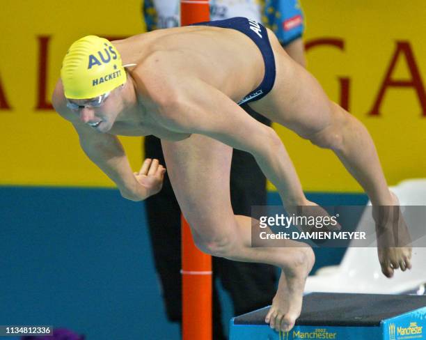 Australian Grant Hackett in action during the 2002 Manchester Commonwealth Games men's 200m freestyle first round 31 July 2002. AFP PHOTO DAMIEN MEYER
