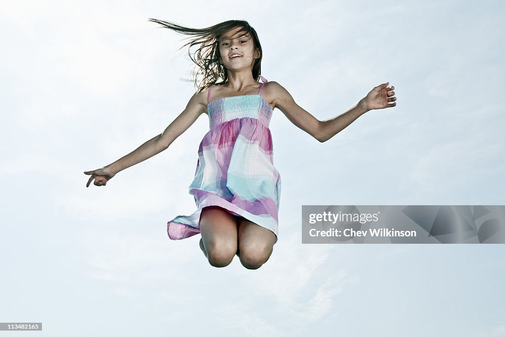 Young girl jumping