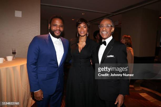 Anthony Anderson, Aisha McShaw, and Reverend Al Sharpton attend the 2019 National Action Network Keepers Of The Dream Awards at the Sheraton Times...