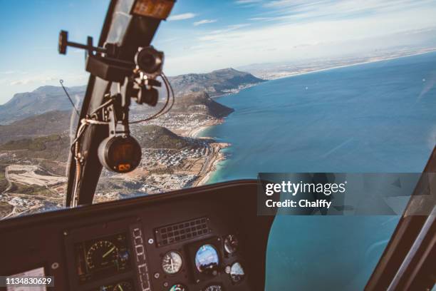 helicopter flight in cape peninsula - inside helicopter stock pictures, royalty-free photos & images