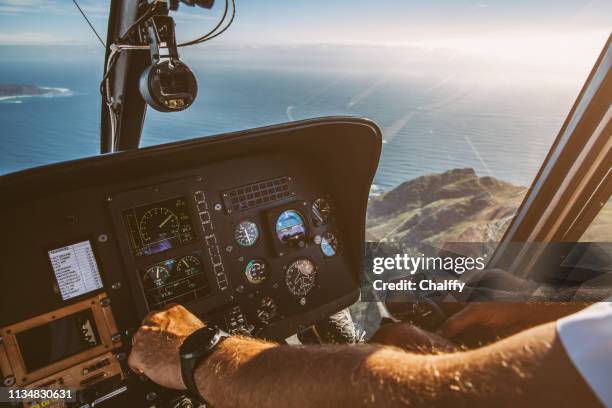 helicopter pilot in cape peninsula - helicopter pilot stock pictures, royalty-free photos & images