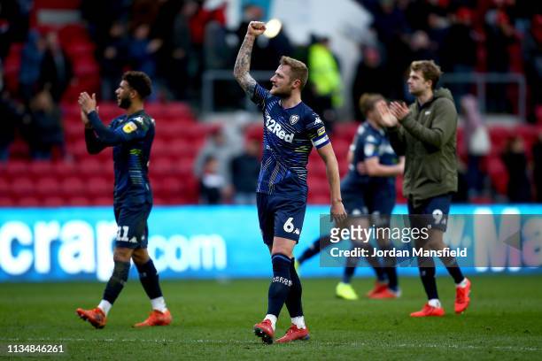 Liam Cooper of Leeds United celebrates at the final whistle after victory in the Sky Bet Championship between Bristol City and Leeds United at Ashton...