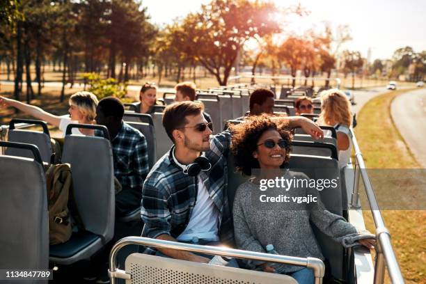 open top bus tour in the city - double decker bus stock pictures, royalty-free photos & images