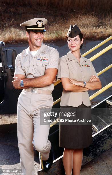 David James Elliott and Catherine Bell star as Lt. Cmdr. Harmon ìHarmî Rabb Jr. And Marine Maj. Sarah ìMacî MacKenzie, in JAG, the adventure drama...