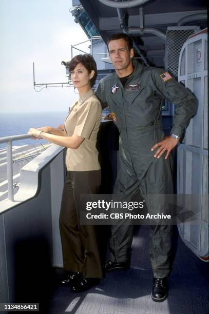 Catherine Bell and David James Elliott star on JAG.