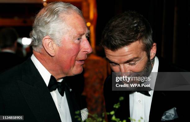 Prince Charles, Prince of Wales speaks with David Beckham prior to the "Our Planet" global premiereat Natural History Museum on April 4, 2019 in...