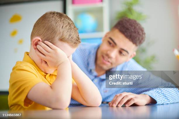 upset schoolchild - teacher crying stock pictures, royalty-free photos & images