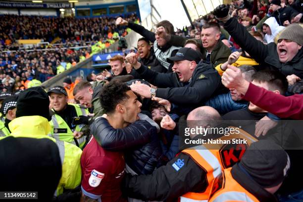 Aston Villa players celebrate with their fans after Jack Grealish of Aston Villa scores his teams first goal during the Sky Bet Championship match...