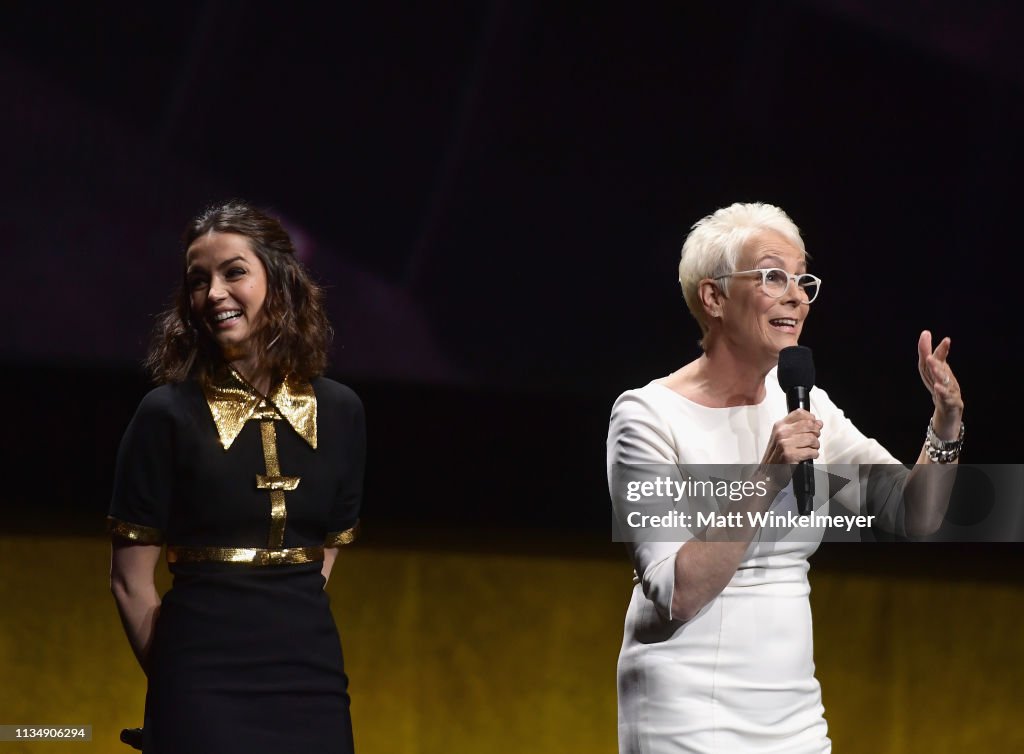 Ana de Armas and Jamie Lee Curtis speak onstage at CinemaCon 2019