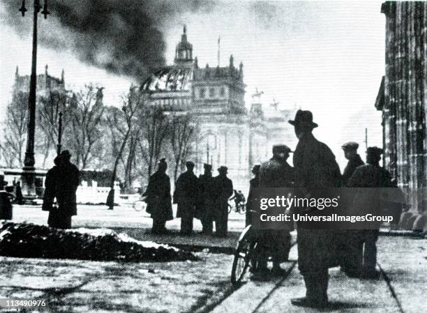 The Reichstag building on fire after an arson attack, Berlin, 27th February 1933. The event, which Adolf Hitler blamed on the Comintern at the time,...