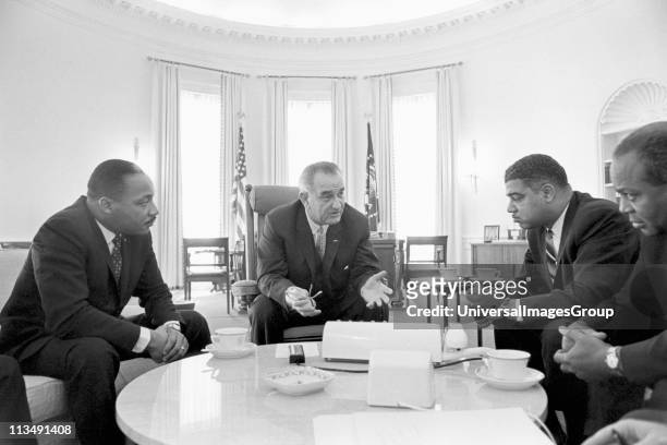 Lyndon Baines Johnson 36th President of the United States in talks with Civil Rights leaders in the White House, including Martin Luther King, Jr ,...
