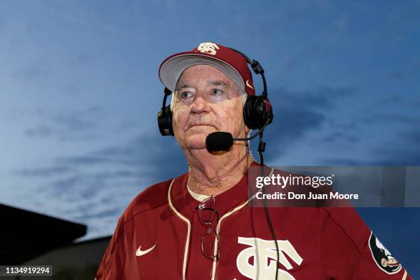 Head Coach Mike Martin of the Florida State Seminoles gives a TV interview after the game against Virginia Tech on Mike Martin Field at Dick Howser...