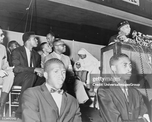 Elijah Muhammad . Converted to Islam in 1931, from 1934 until his death be was leader of the Nation of Islam. Here in 1964 addressing followers...