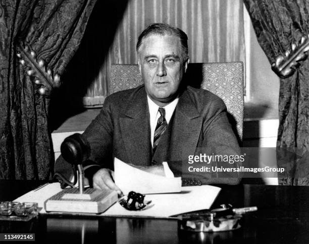 Franklin Delano Roosevelt , 32nd President of the United States of America 1933-1945, giving one of his 'fireside' broadcasts to the American nation...