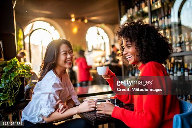 two friends having a coffee. - coffee italy stock pictures, royalty-free photos & images
