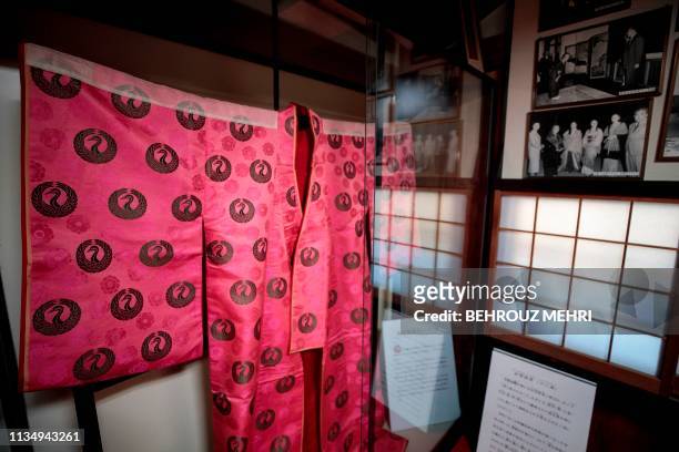 This picture taken on March 2, 2019 shows the outer layer of a junihitoe, which is a many-layered kimono, at the Kimono Museum in Ome, Tokyo...