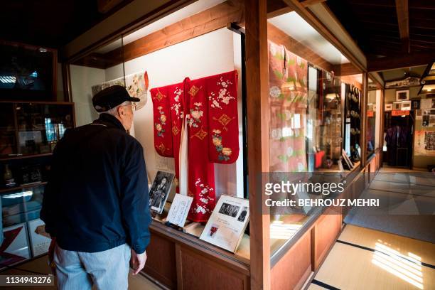This picture taken on March 2, 2019 shows a kimono, that was worn by Japanese princess Nobuko, eighth daughter of late Emperor Meiji, at the Kimono...