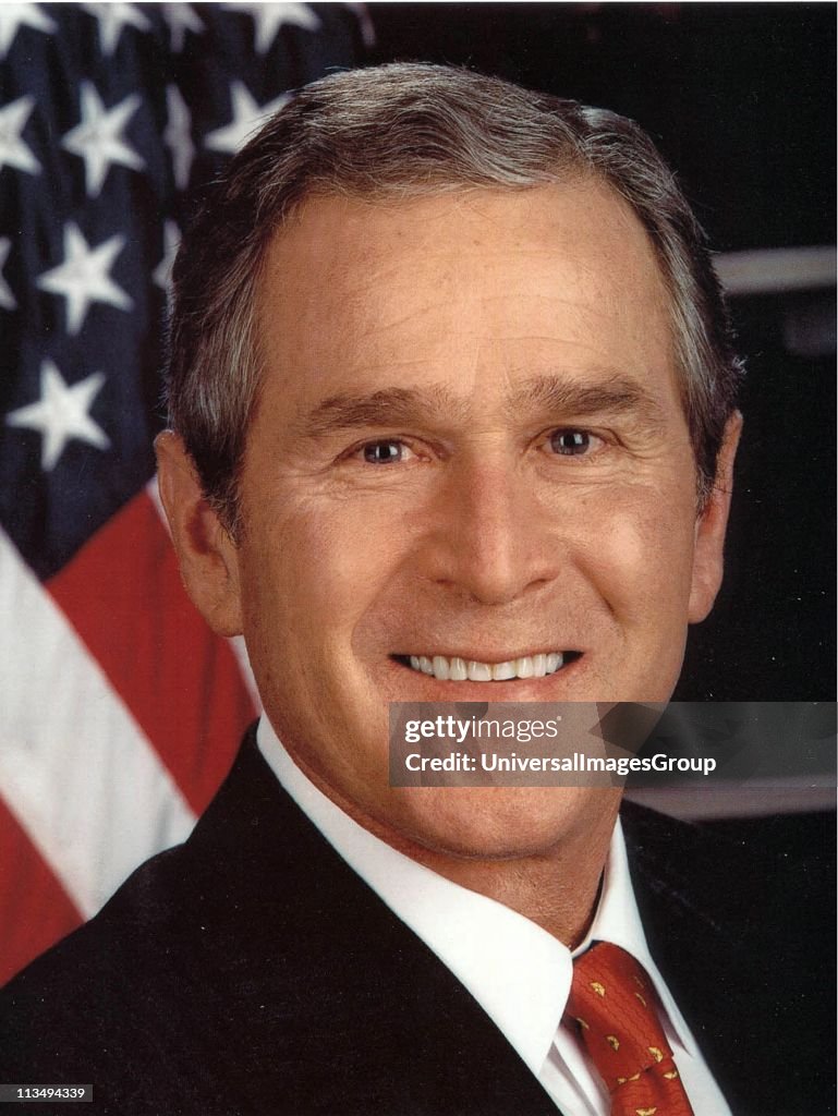 George Walker Bush (born 1946) 43rd President of the United States 2001-2009. 46th Governor of Texas 1995-2000. Head-and-shoulders portrait with stars-and-stripes in background. American Politician Republican.