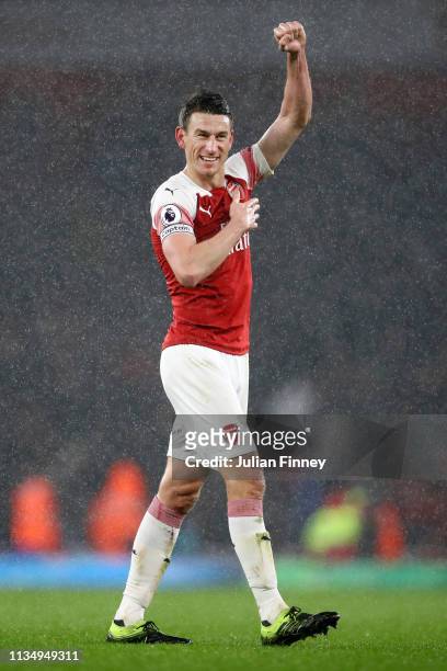 Laurent Koscielny of Arsenal celebrates victory following the Premier League match between Arsenal FC and Manchester United at Emirates Stadium on...