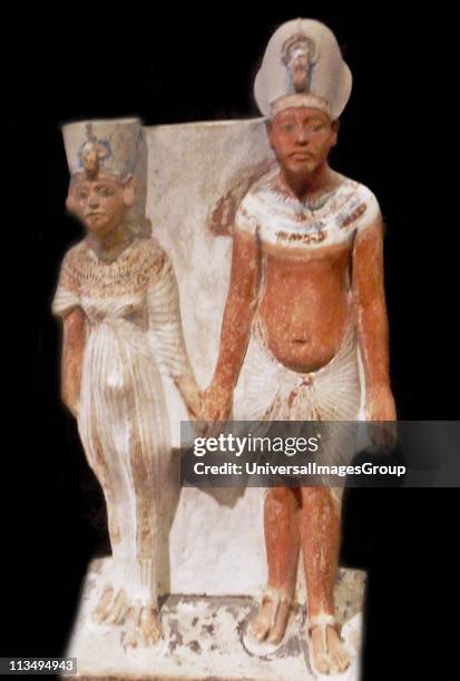 Akhenaten and Nefertiti after 1345 BC. AD painted limestone.