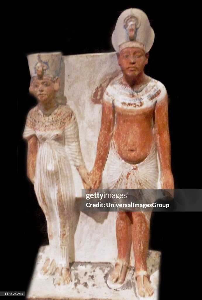 Akhenaten and Nefertiti after 1345 BC. AD (after year 9 of the realm) painted limestone.