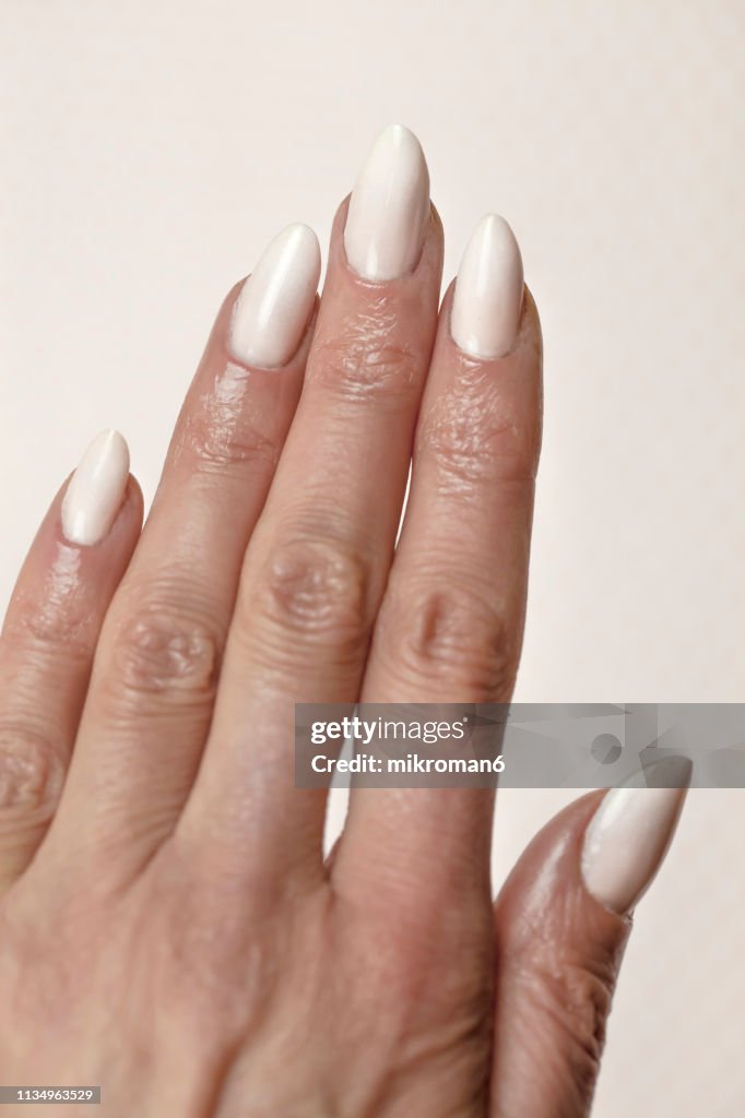Close-Up Of Woman Fingers With Nail Art, Baby-Boomer-French-Manicure