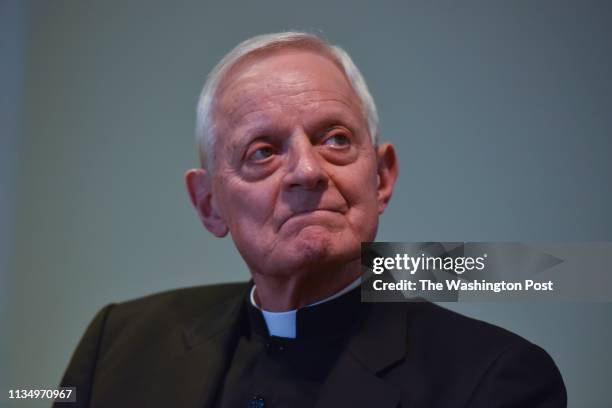 Cardinal Donald Wuerl sits by as Archbishop Wilton D. Gregory is introduced as the new leader of the Catholic Church in Washington, DC, on Thursday,...