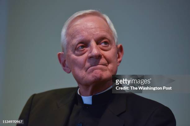 Cardinal Donald Wuerl sits by as Archbishop Wilton D. Gregory is introduced as the new leader of the Catholic Church in Washington, DC, on Thursday,...