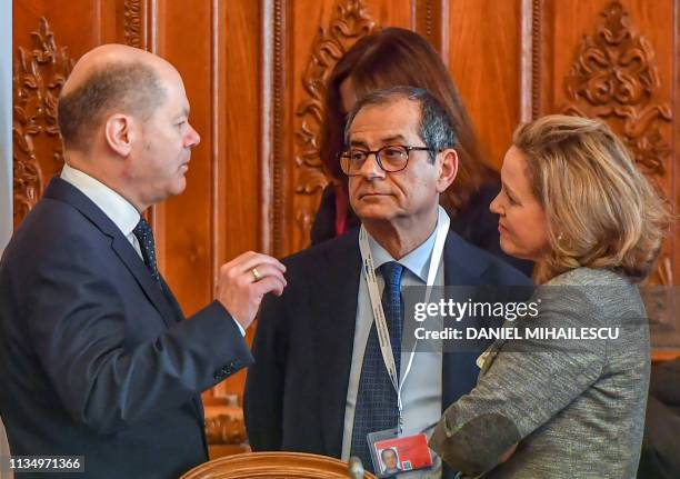 Gerrmany's Finance Minister Olaf Scholz, Italy's Minister of Finance Giovanni Tria and Spanish counterpart Nadia Calvino talk at an informal meeting...