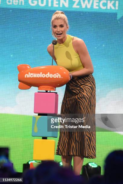 Lena Gercke is seen on stage at the Nickelodeon Kids Choice Awards on April 4, 2019 in Rust, Germany.